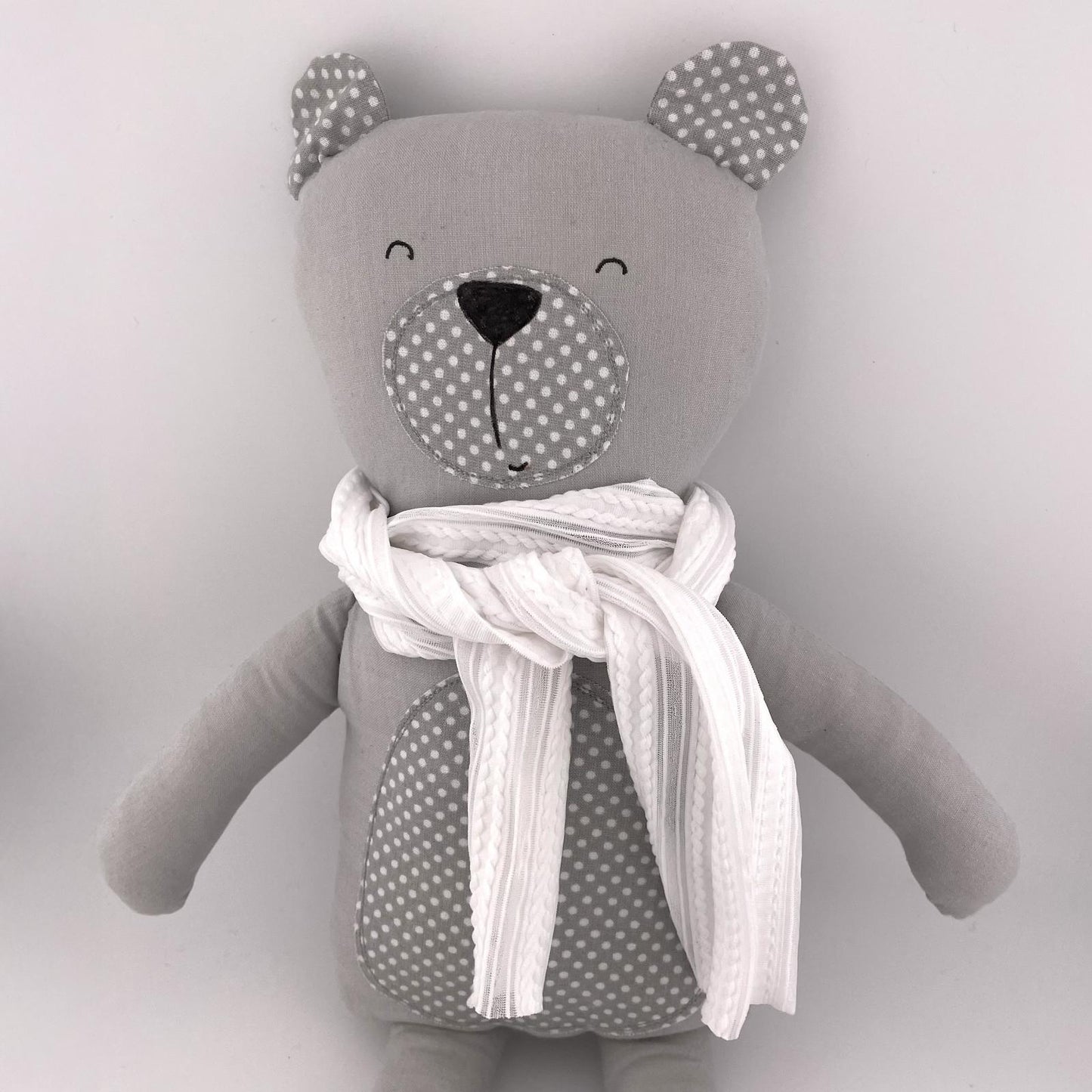 Bambola orsetto grigio