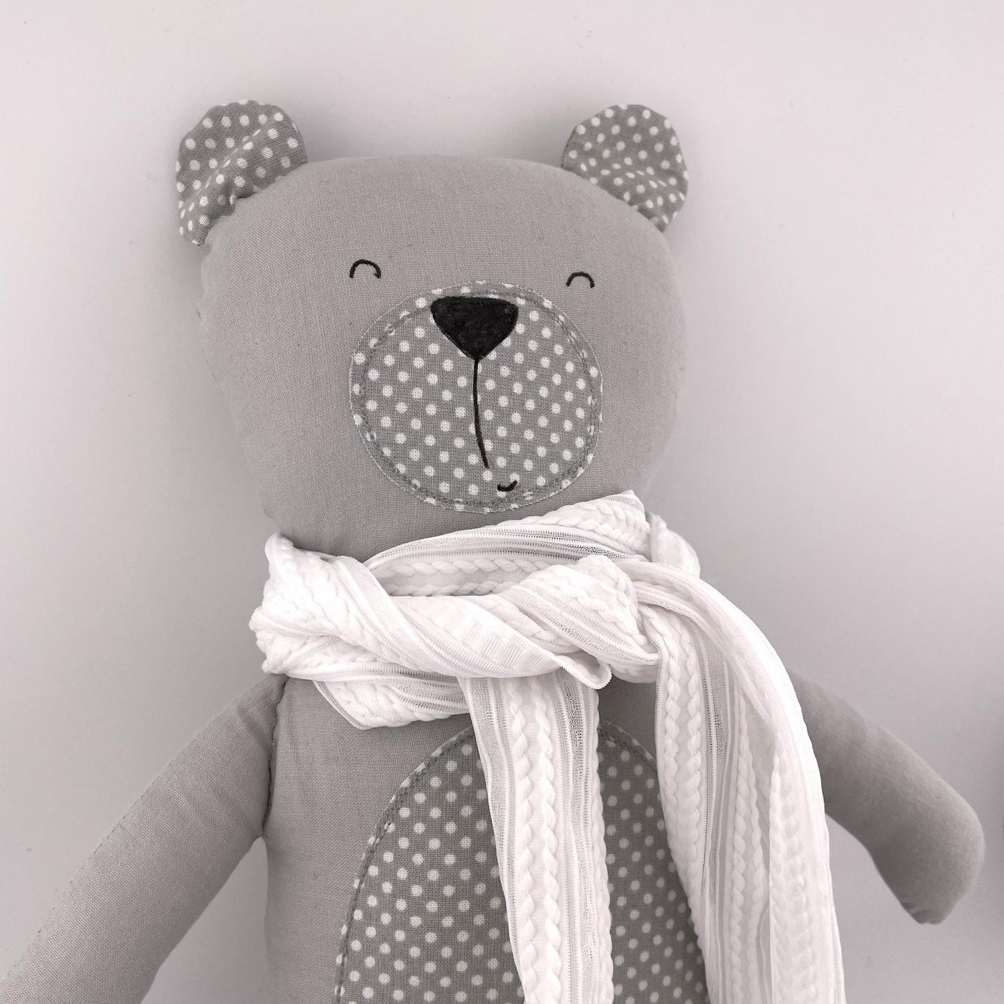 Bambola orsetto grigio