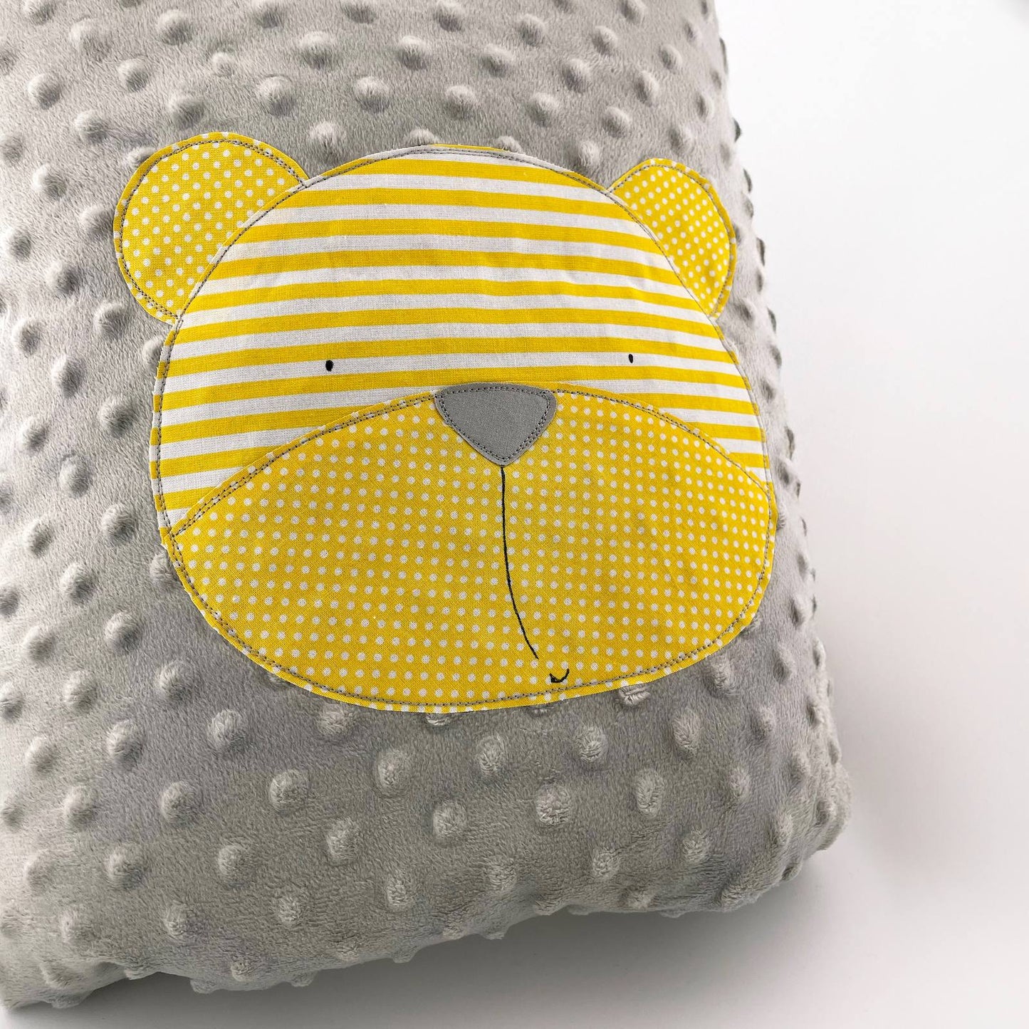 Trapuntino minky grigio con orso giallo