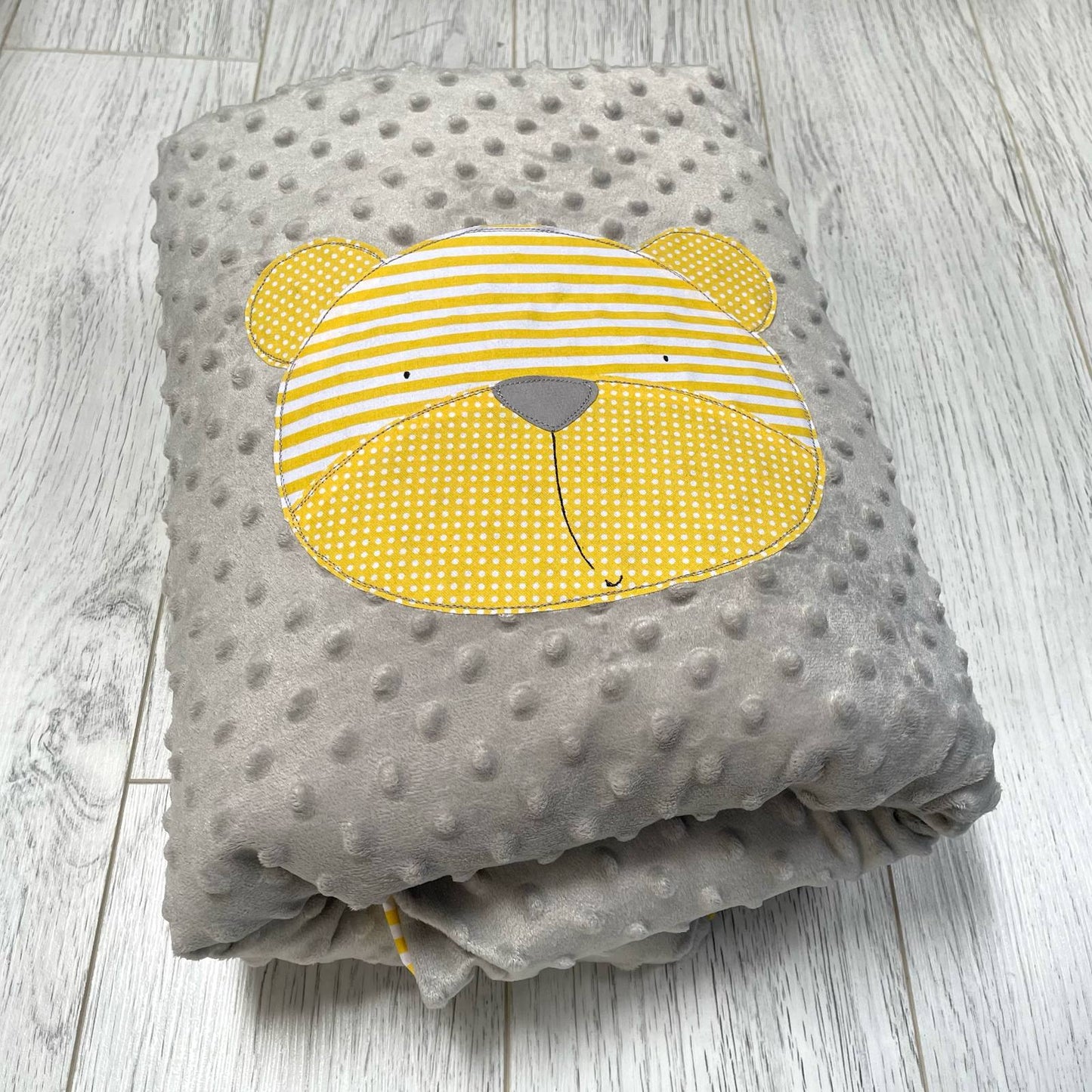 Trapuntino minky grigio con orso giallo